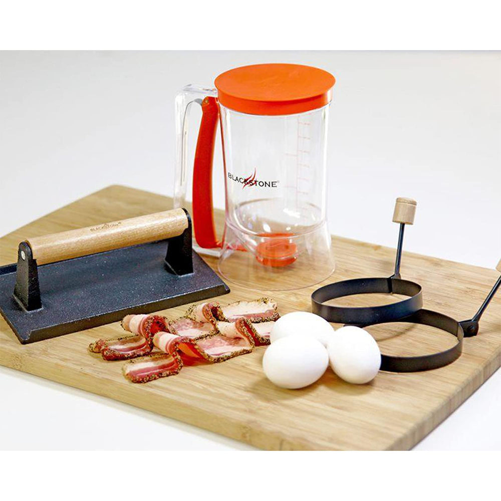 Blackstone kit en usage sur plancha montre cuisson coordonnée pour service rapide