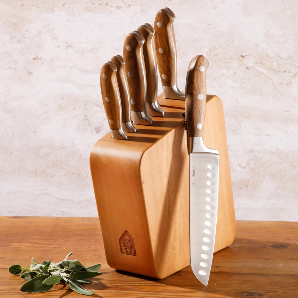 bloomhouse détail manche en bois d'olivier montrant grain et durabilité