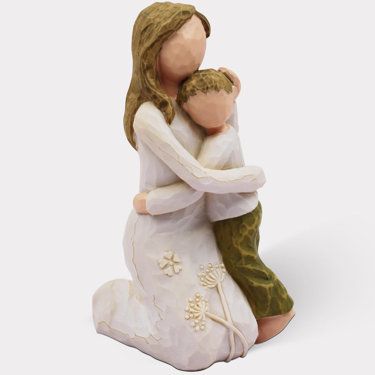 BORLESTA figurine devant montrant mère et fils, évoque amour familial