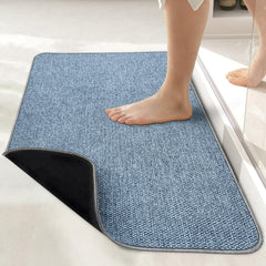 bosap tapis de bain face avant bleu montrant absorption et look décoratif