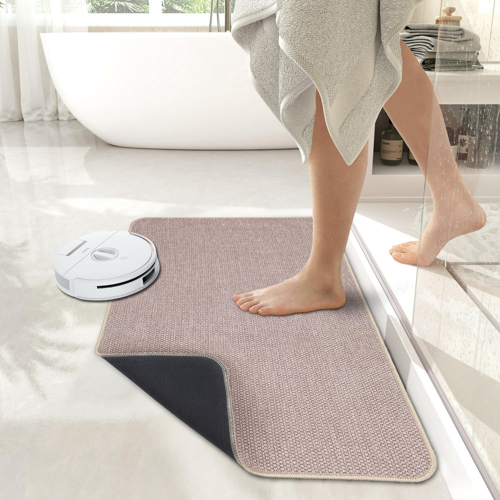 Bosap tapis beige dans une salle de bain décorée apportant élégance et fonctionnalité