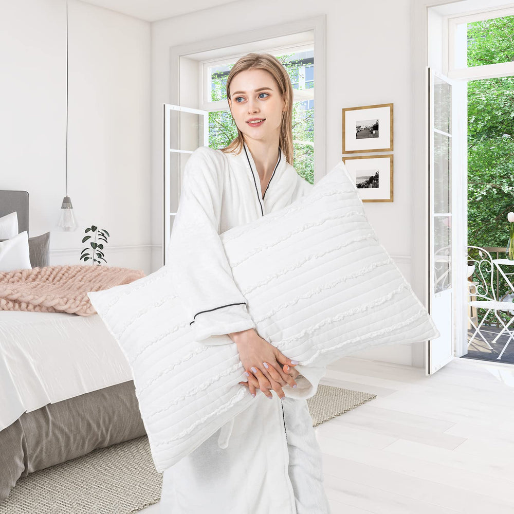 BOSOWOS taies utilisées sur canapé, transforment l'espace salon en accueillant
