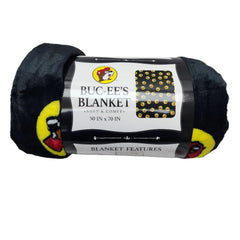 Plaid Buc-ee's plié montrant le devant et l'étiquette, compact et pratique