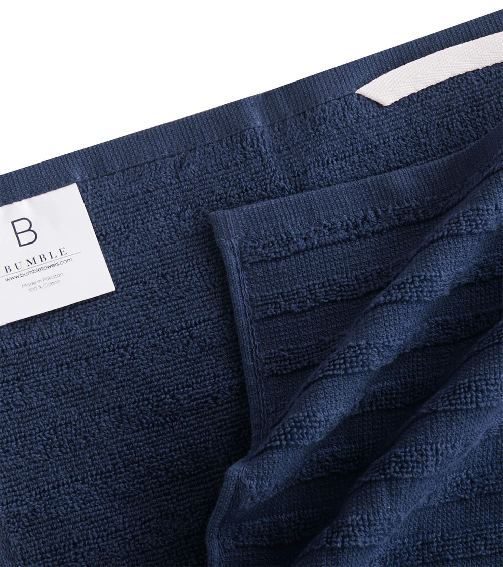 Bumble Towels gros plan éponge terry absorbante pour liquides importants