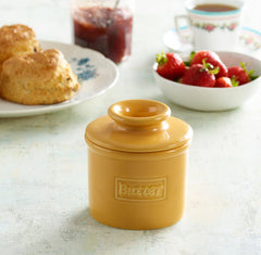 Butter Bell L. Tremain en usage sur table, beurre toujours tartinable