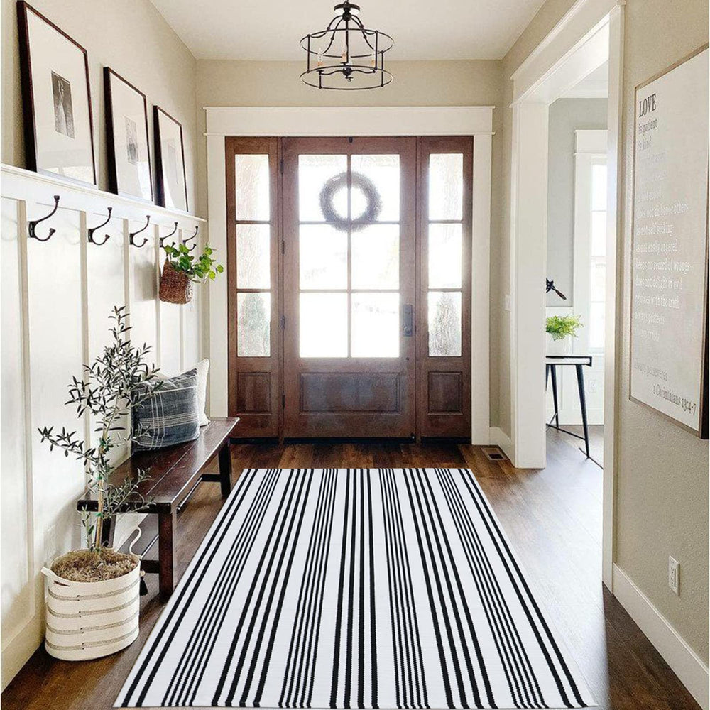 CAINANEL tapis à côté d'une règle montrant dimensions pratiques