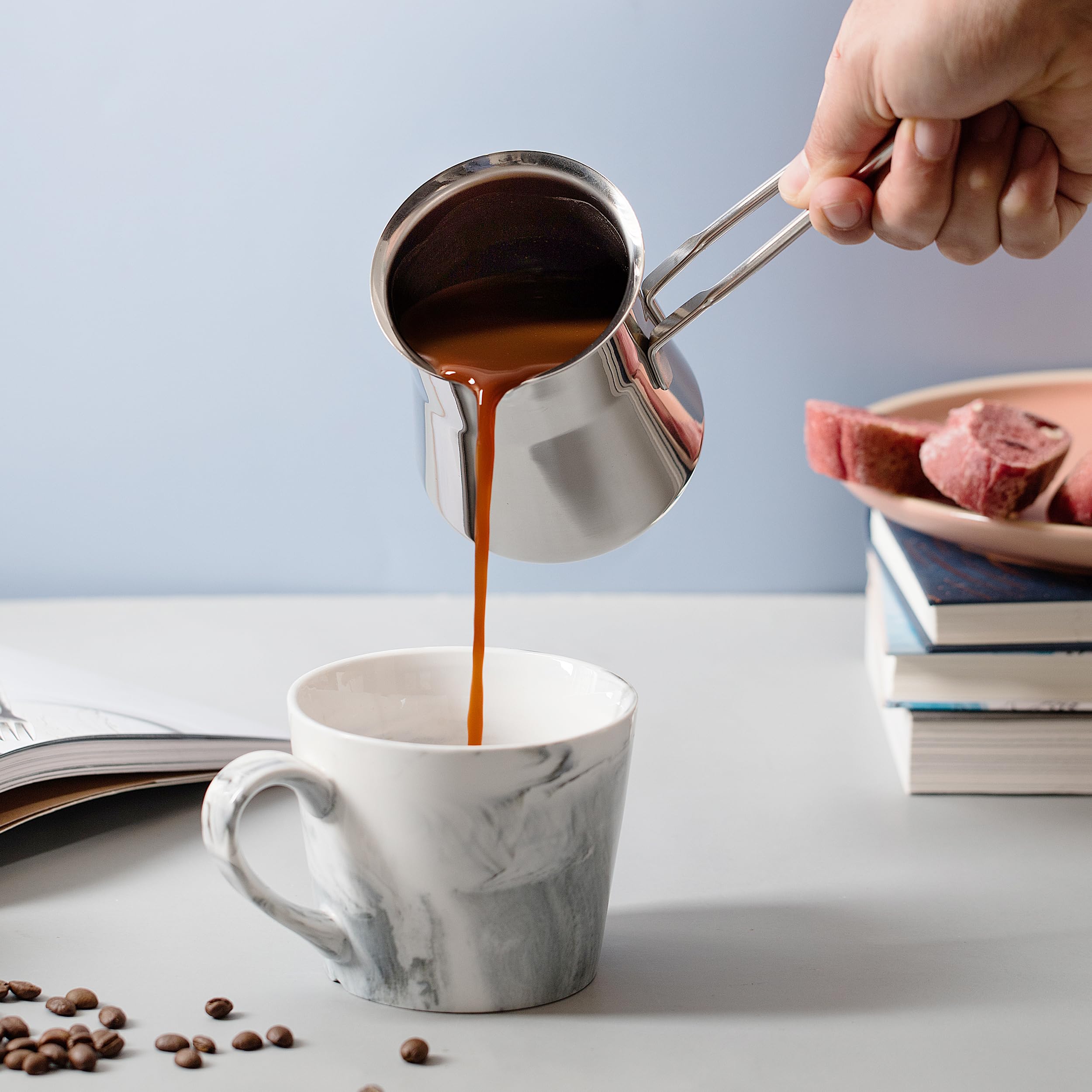Caizen Coffee briki en usage sur plaque électrique pour préparation lente