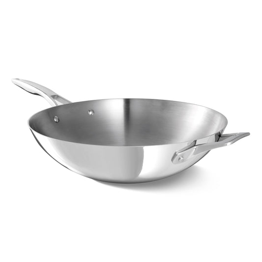 Calphalon wok face avant finition brossée et poignée rivetée pour maniabilité