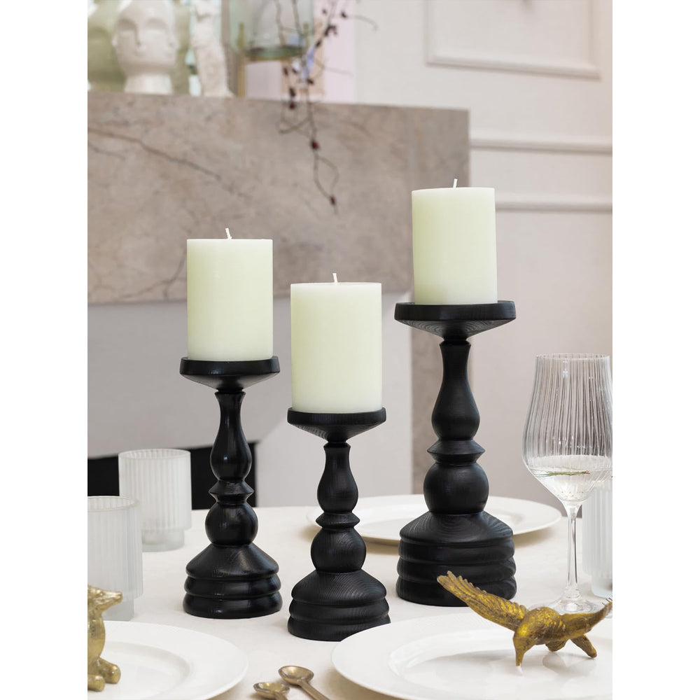 CANDWAX bougies sur bougeoir table créant lumière chaleureuse décorative