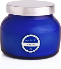 Capri Blue pot en verre bleu devant montre design et éclat
