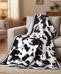 CAROMIO plaid devant emballage montrant motif vache et confort immédiat