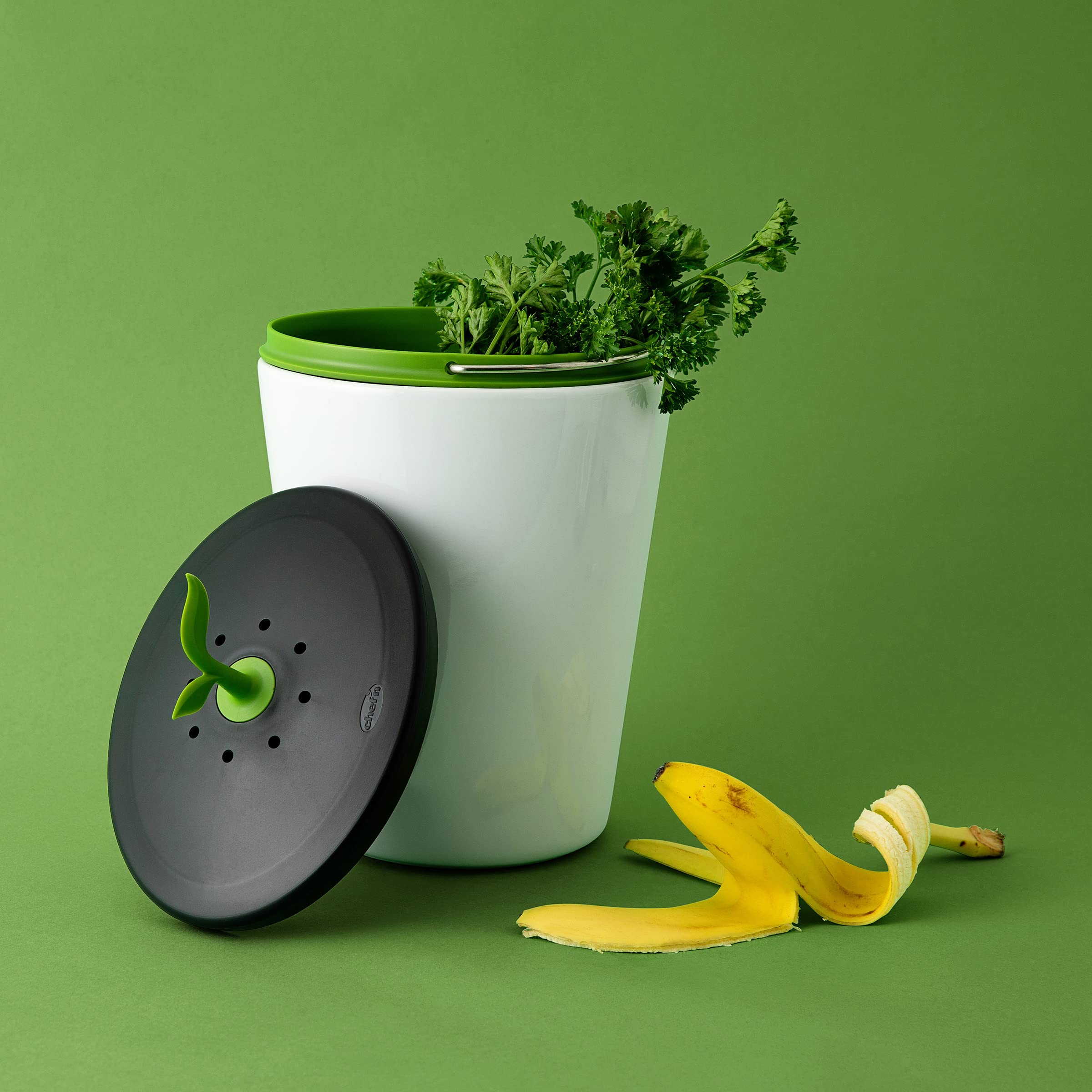 Chef'n EcoCrock comparaison taille avec une main, compact pour petits espaces