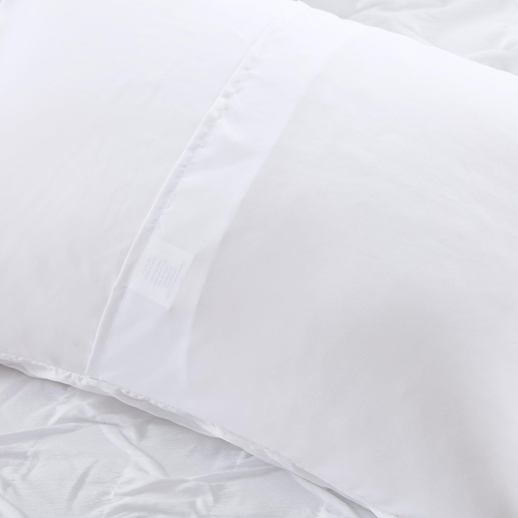 Comfort Spaces étiquette OEKO-TEX sur emballage, qualité certifiée visible
