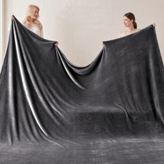 COOVA couverture étalée sur canapé pour protection et style cosy