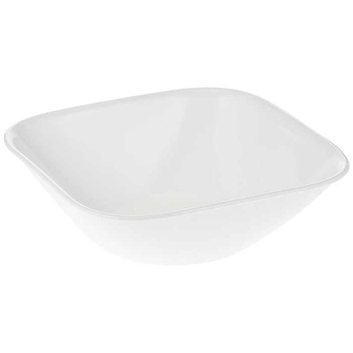 Corelle table dressée en blanc pur montrant polyvalence et esthétique contemporaine