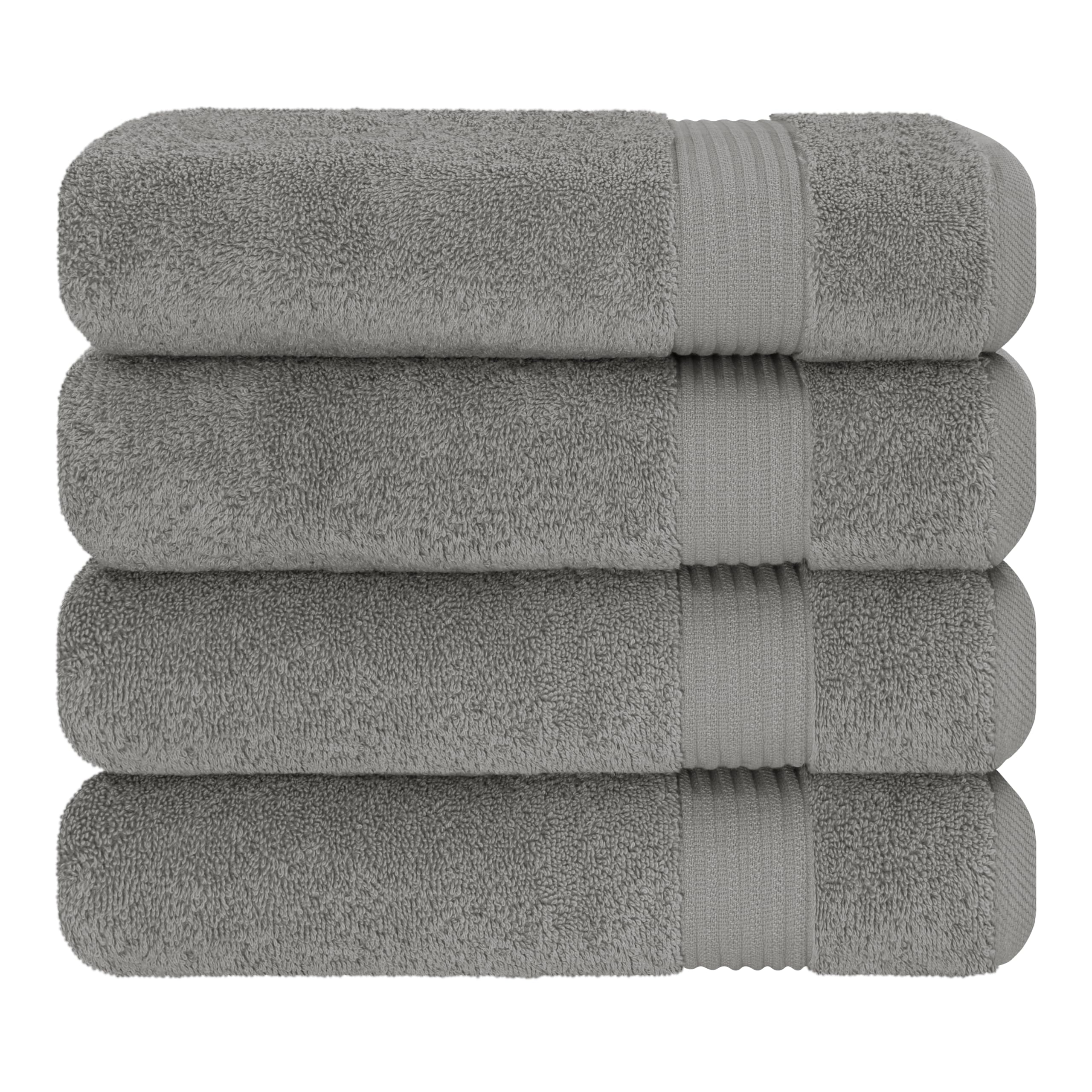 Cotton Paradise pile pliée dans salle de bain apportant style et rangement