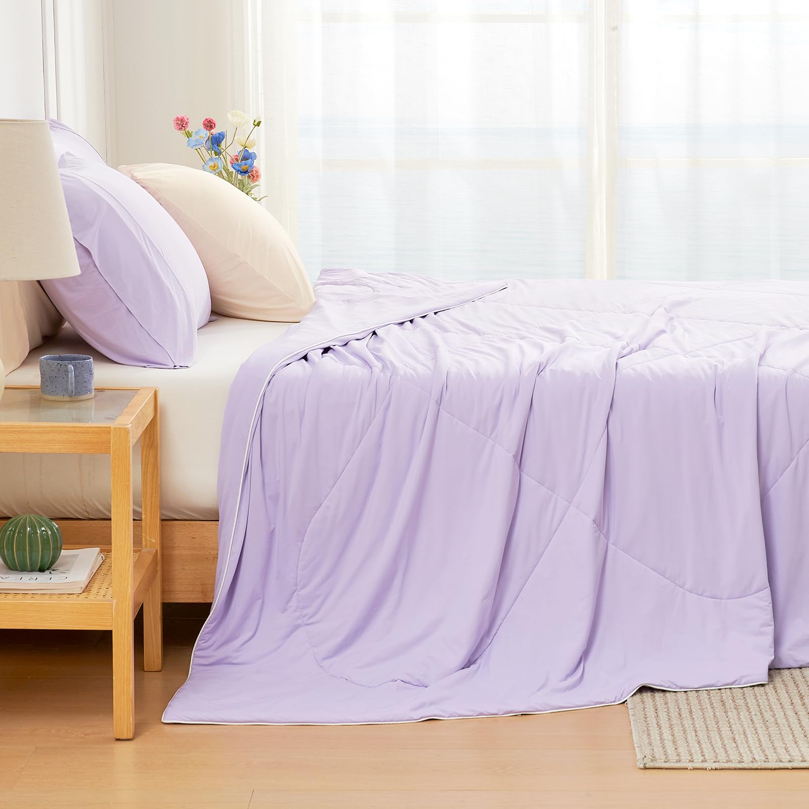 Cozy Bliss sur lit queen illustrant confort frais pour nuits chaudes