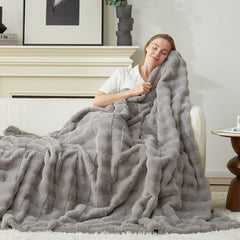 Cozy Bliss plaid face avant gris montrant design élégant et confort convivial