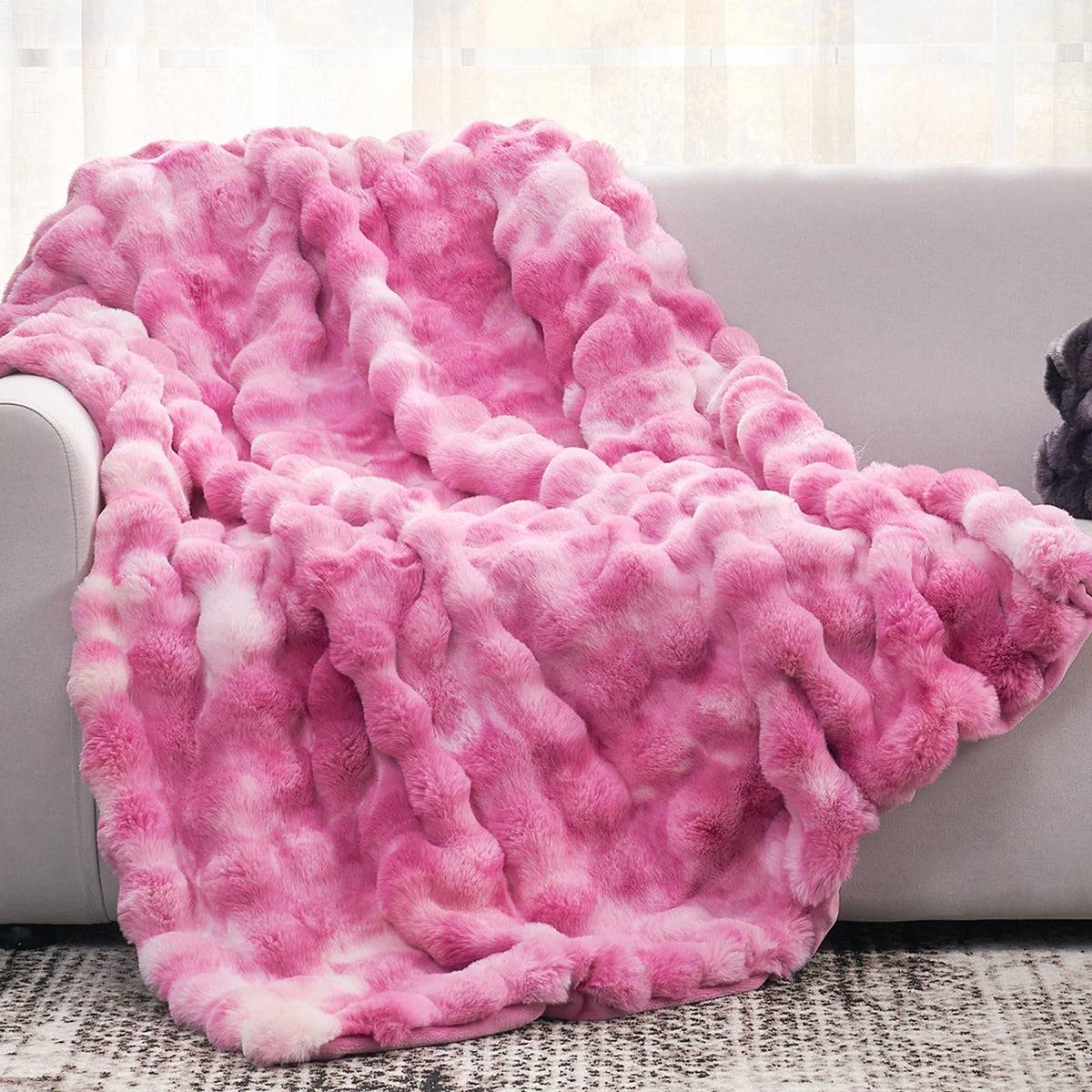 Cozy Bliss vue avant du plaid tie-dye rose pour décoration chaleureuse