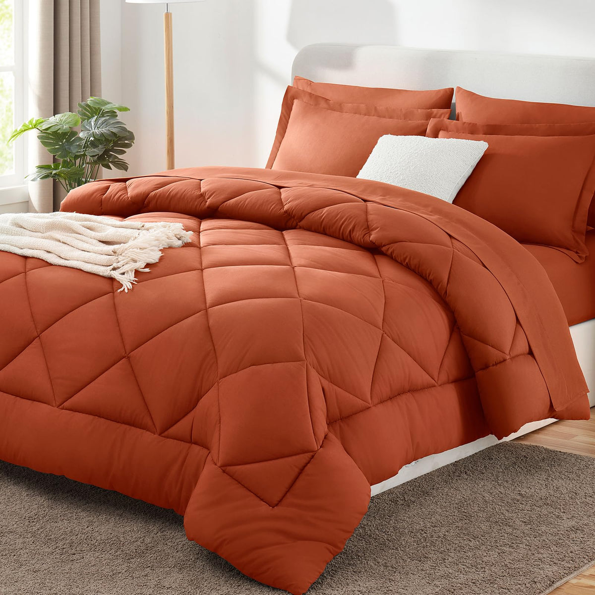 CozyLux devant de l'ensemble 7 pièces montrant finition soignée et style brûlé orange