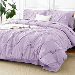 CozyLux vue frontale de l’ensemble 7 pièces montrant finition pintuck et drapé