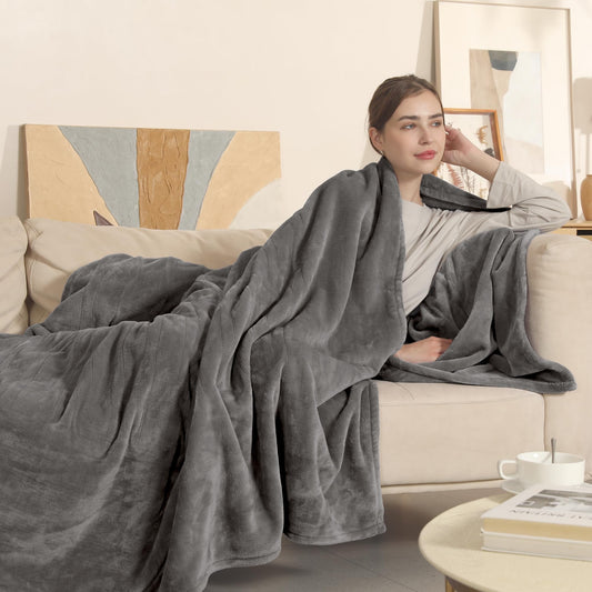 COZYTY couverture électrique pliée montrant taille généreuse et rangement pratique