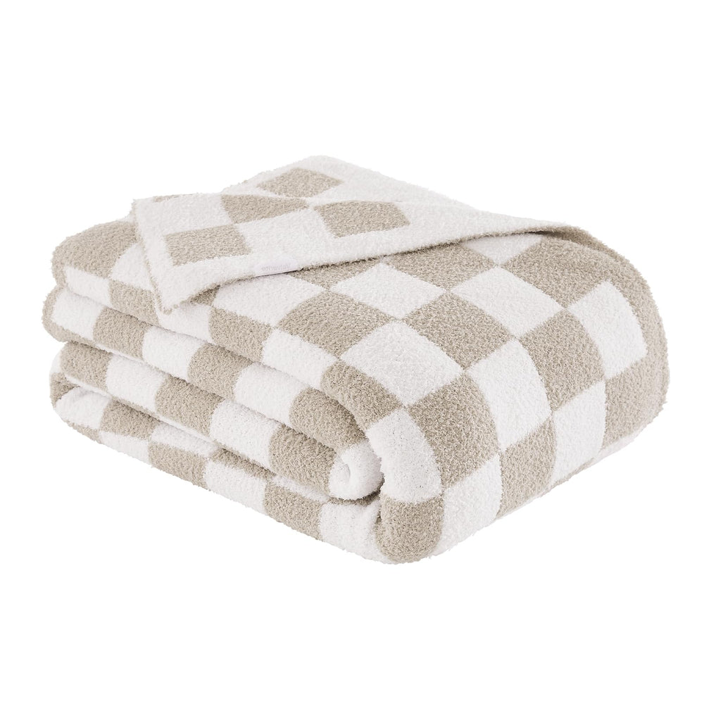 Cozzenity plaid détail couture montrant finition bicolore soignée