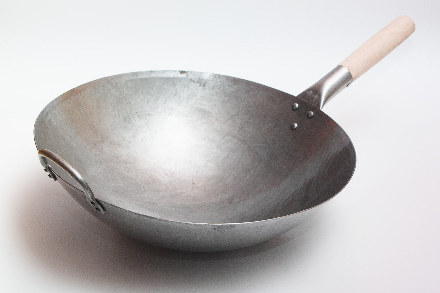 Craft Wok en usage saisissant des légumes pour cuisson homogène