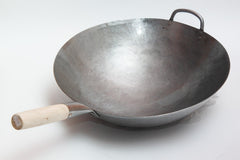 Craft Wok vue de profil montrant le fond rond et profondeur utile