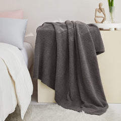 CYMULA comparaison taille 50x60 pouce montrant proportions sur fauteuil