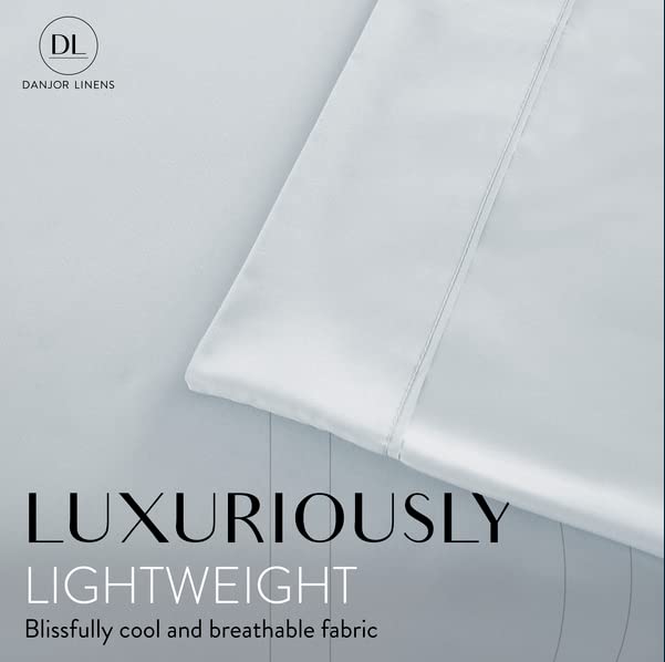 Danjor Linens lit fait en ice blue illustrant apparence apaisante et confort visuel
