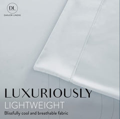 Danjor Linens lit fait en ice blue illustrant apparence apaisante et confort visuel