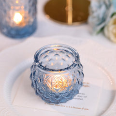 DARJEN porte-bougies en usage sur table décorée pour réception chaleureuse