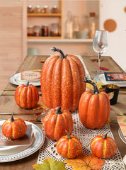 DearHouse trois citrouilles disposées sur table pour centre de table festif