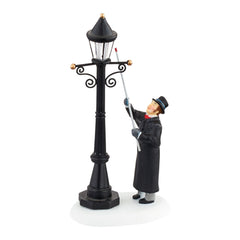 Department 56 Lighting the Lane face avant montrant l'éclairage chaleureux et l'ambiance
