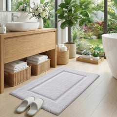 DEXI tapis placé devant lavabo illustrant usage quotidien