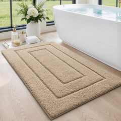 DEXI vue de face du tapis de bain beige montrant forme et finition pratique