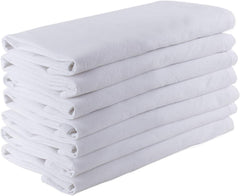 Gros plan du tissu DG Collections montrant tissage serré et texture lisse