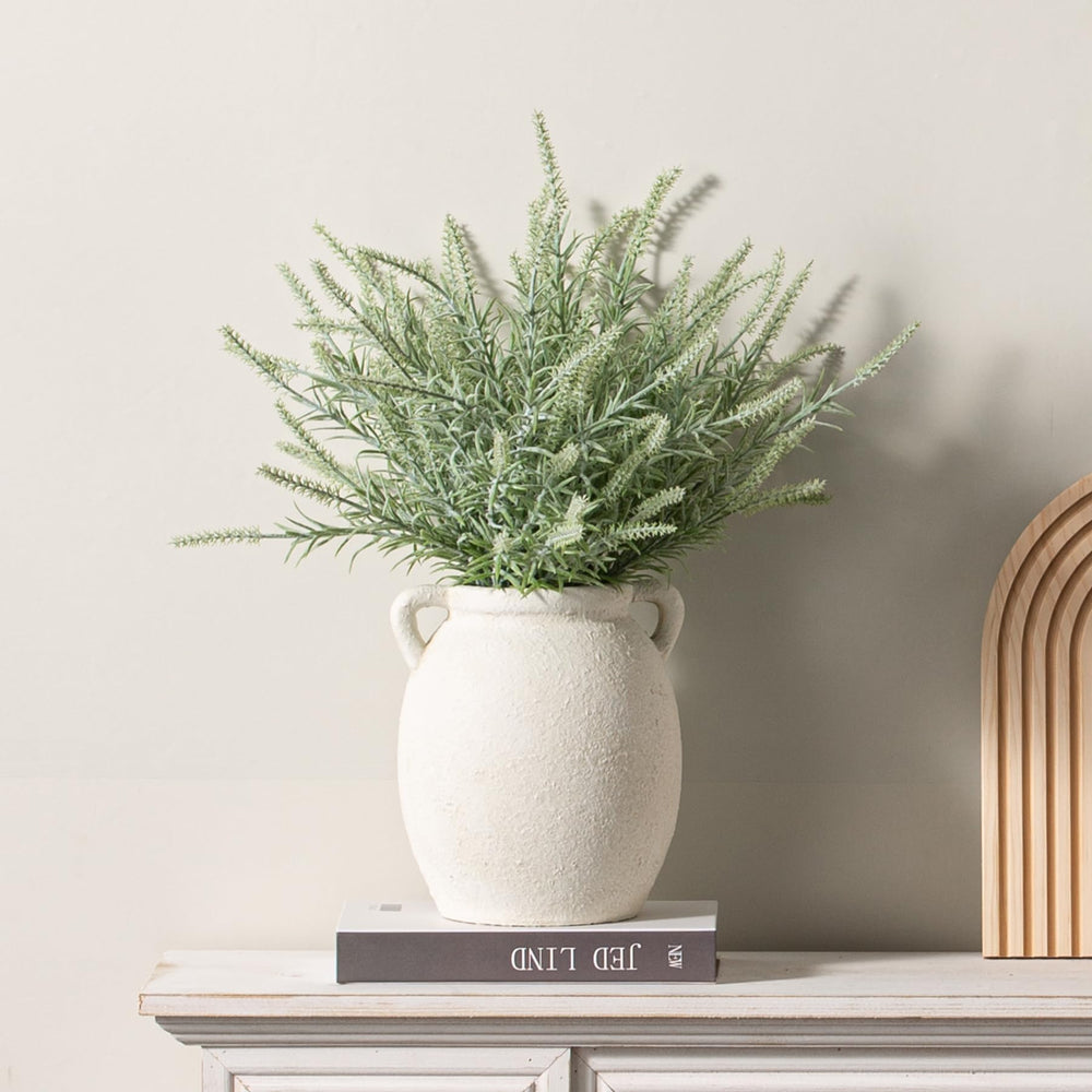 Dobbyby utilisé comme pot à ustensiles pratique et décoratif en cuisine
