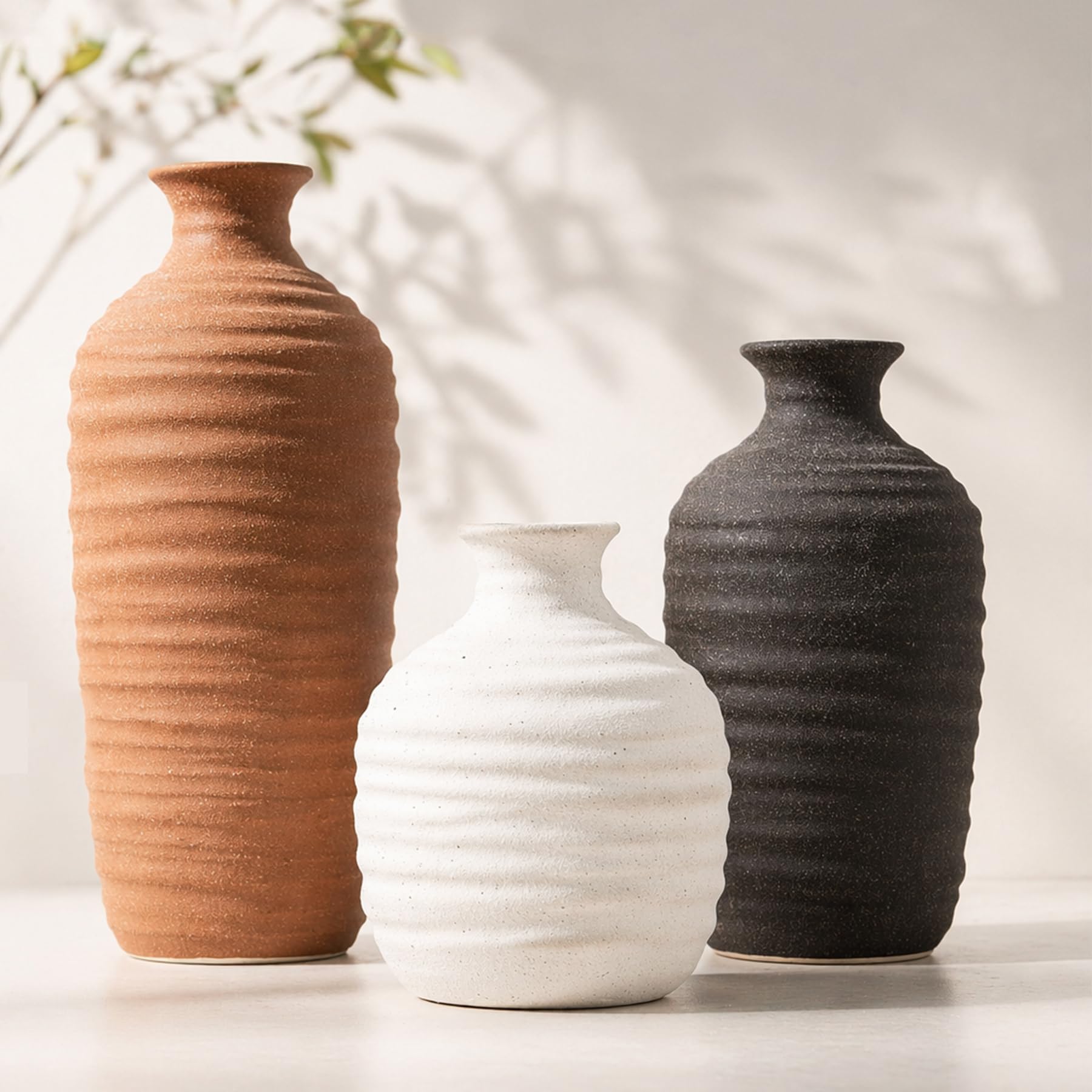 Dobbyby vase ensemble devant montrant trois tailles et polyvalence décorative