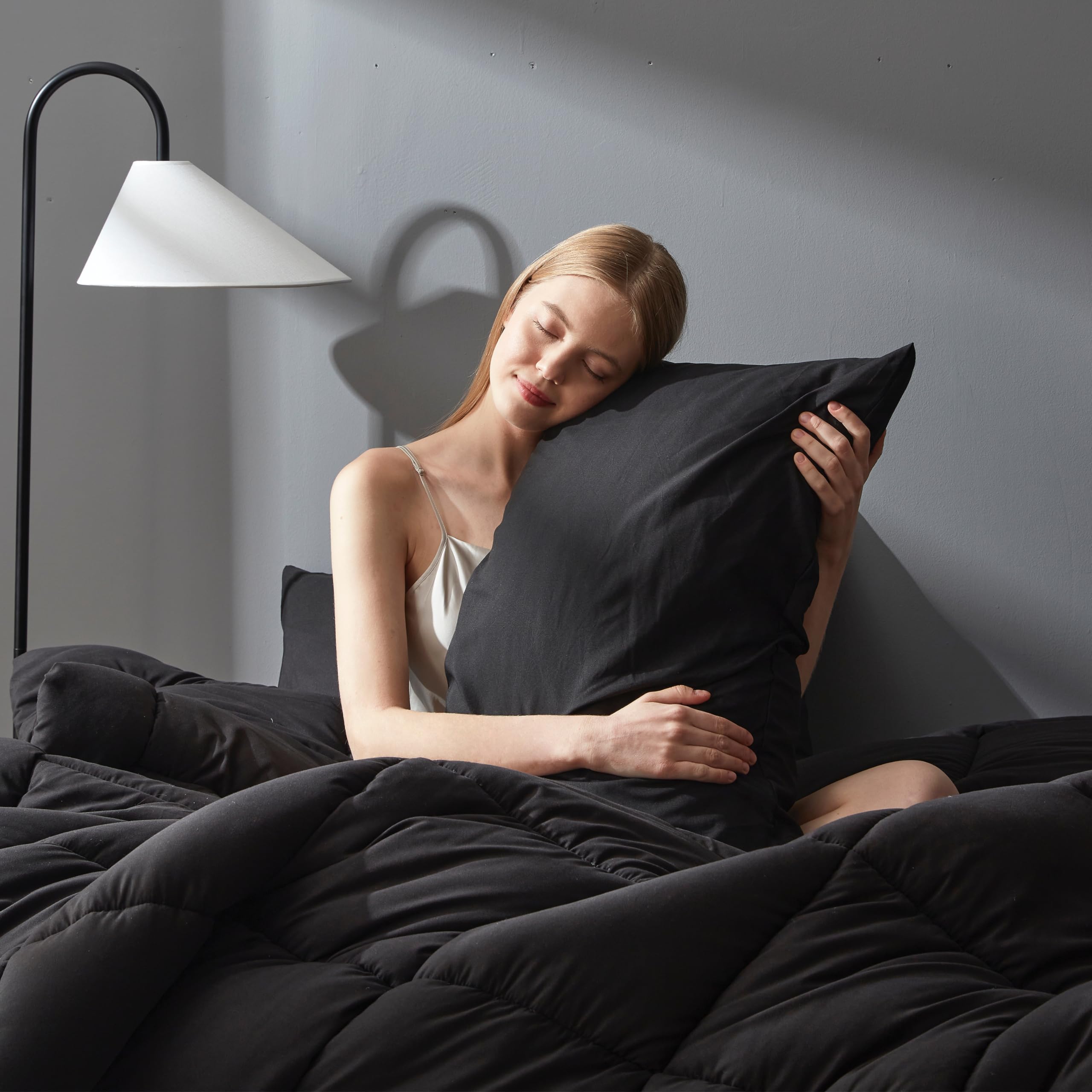 DOWNCOOL détail matelassage en carrés, maintien uniforme du garnissage