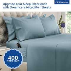 DREAMCARE gros plan du drap-housse avec poche latérale pratique pour objets