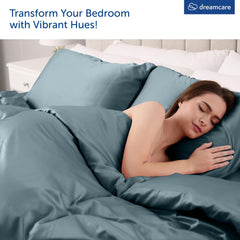 DREAMCARE ensemble plié montrant le drap plat et quatre taies incluses