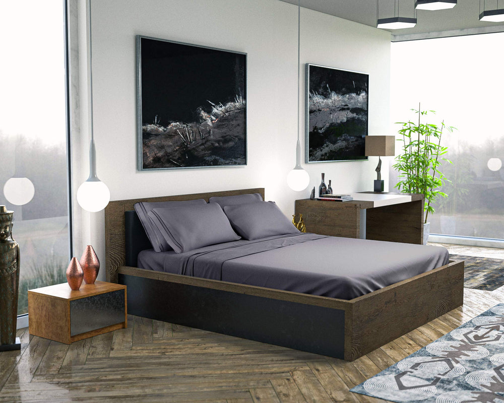 DREAMCARE lit king aménagé en chambre illustrant confort et esthétique