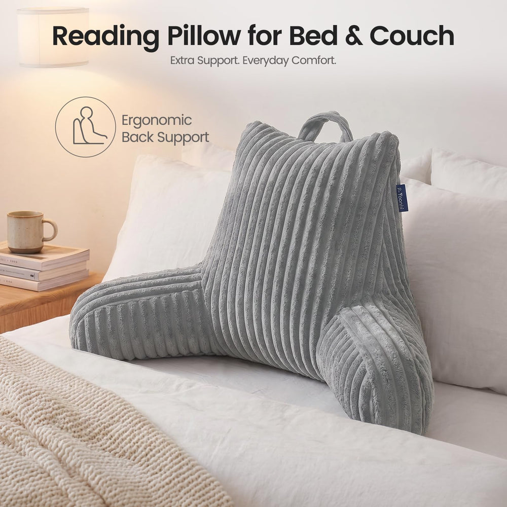 E-Yoochi comparatif d'échelle montrant taille du coussin par rapport à un oreiller standard