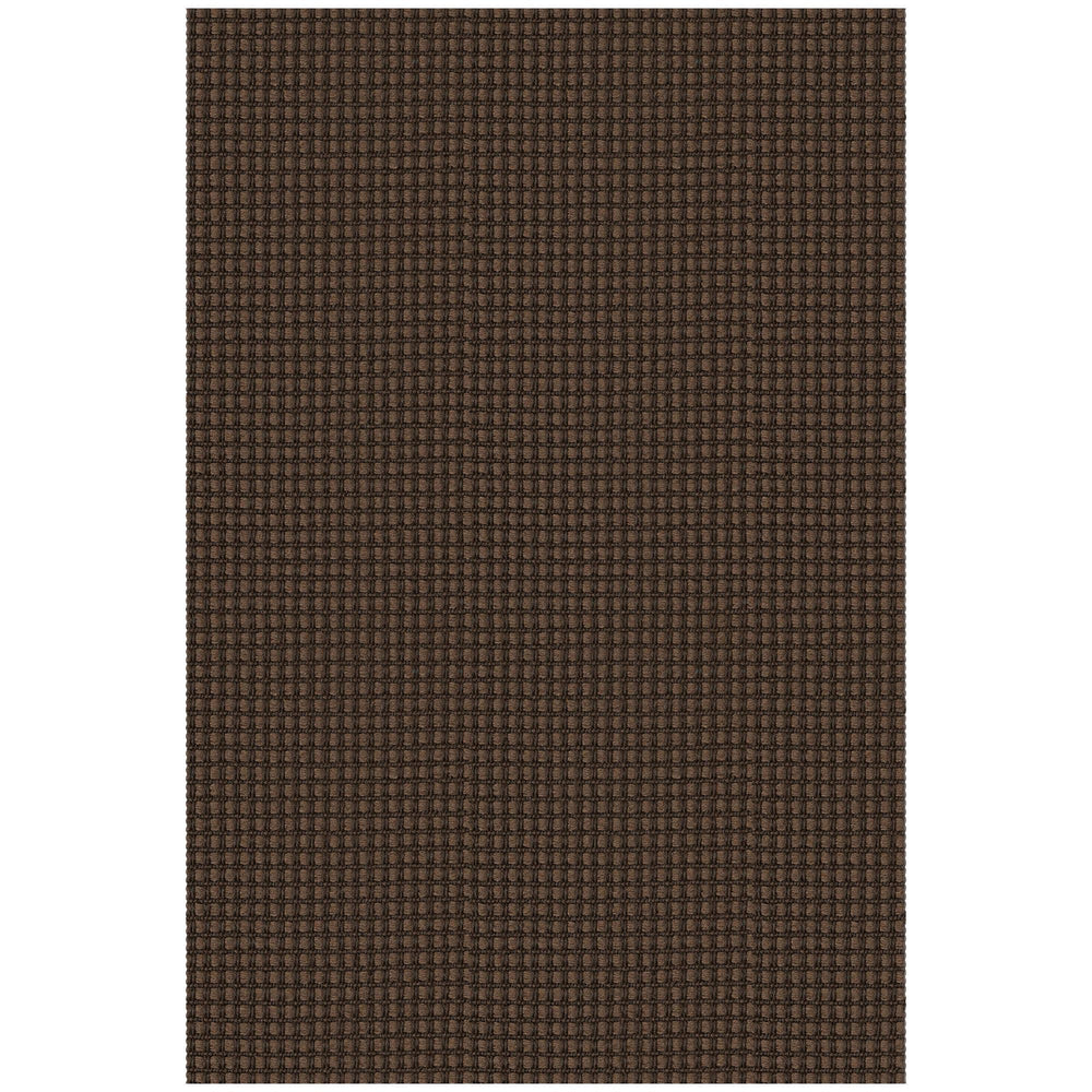 EARTHALL détail coupe manuelle montrant caractère artisanal du tapis