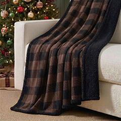 Eddie Bauer plaid sur canapé créant une atmosphère cosy immédiate
