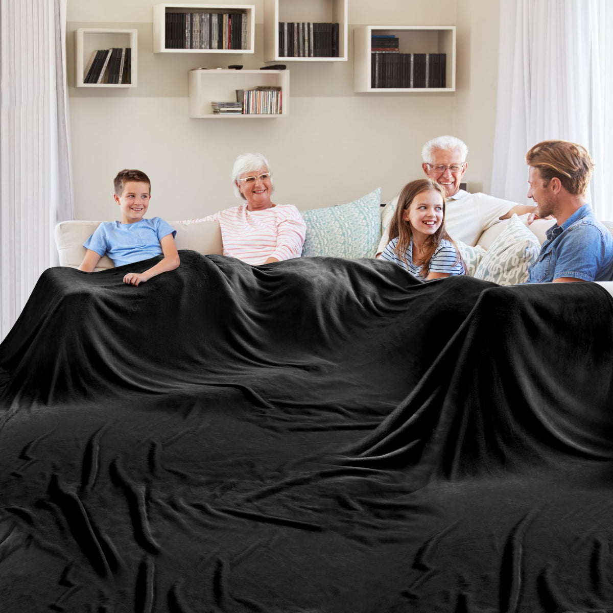 Edenleaf couverture géante recto noir montrant le drapé et confort familial