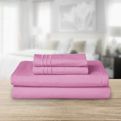 Elegant Comfort gros plan broderie trois lignes sur taie, finition élégante