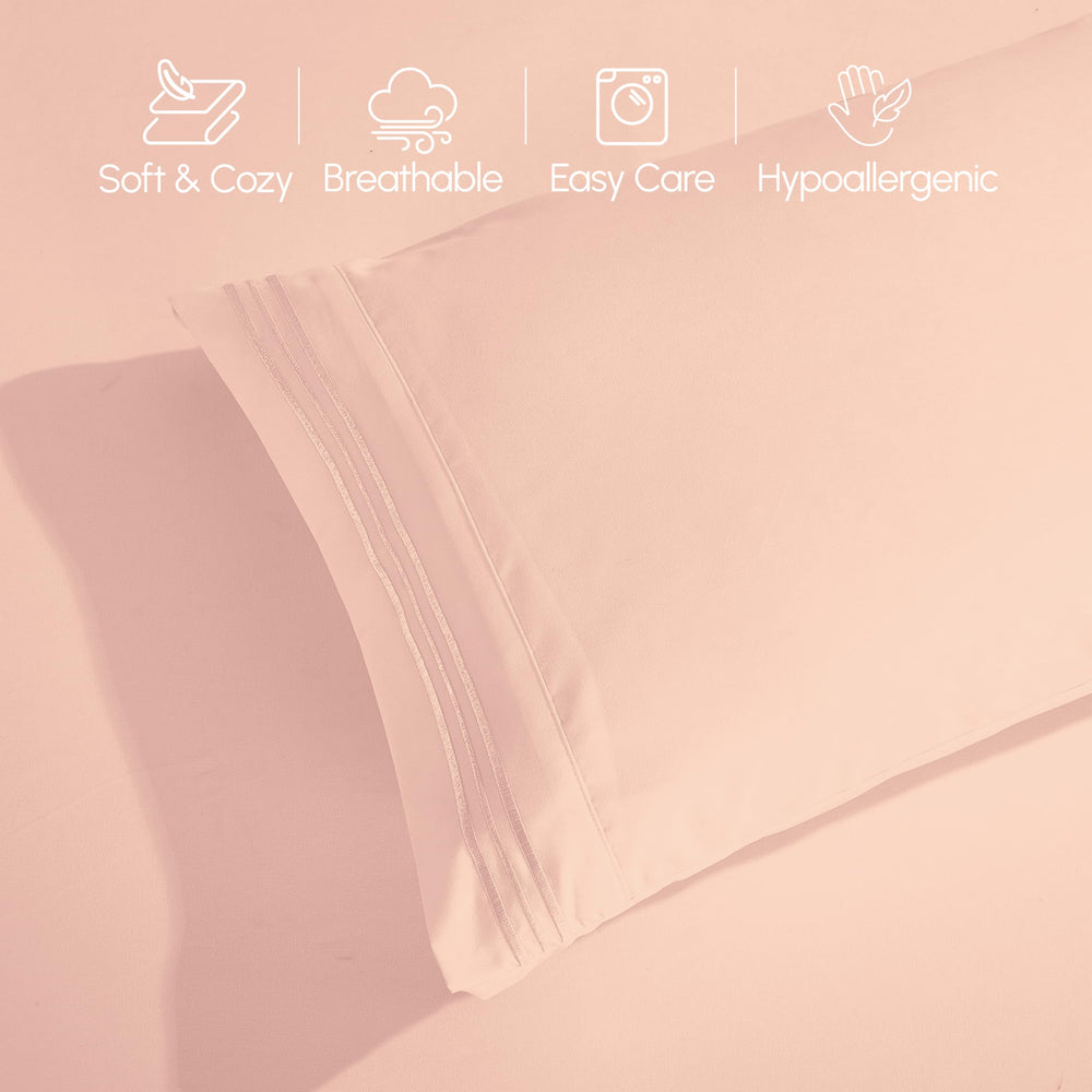 Elegant Comfort linge présenté sur lit fait pour un rendu net et accueillant